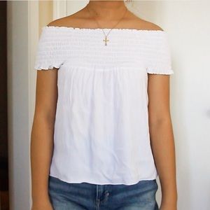 Brandy Melville Tops - White Seymour smocked top Brandy Melville Tops - White Seymour smocked top